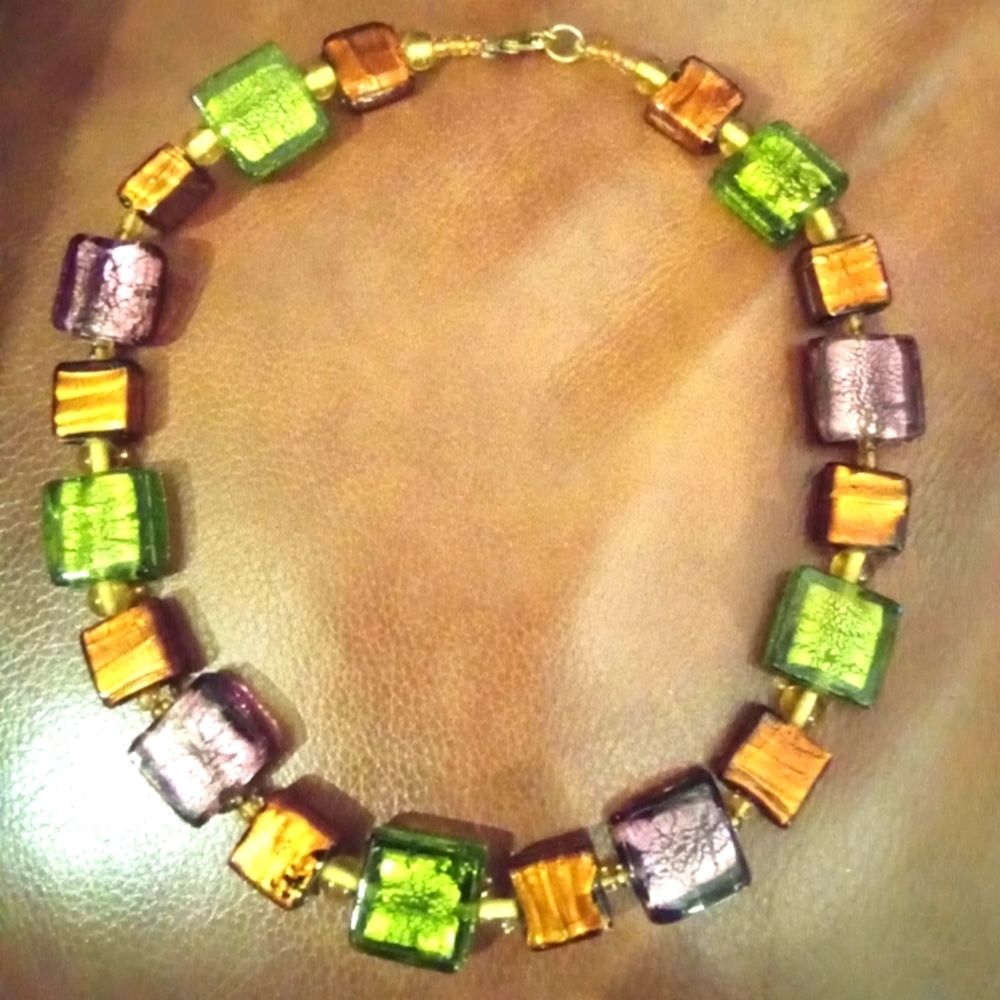 Artisan made beaded choker necklace.